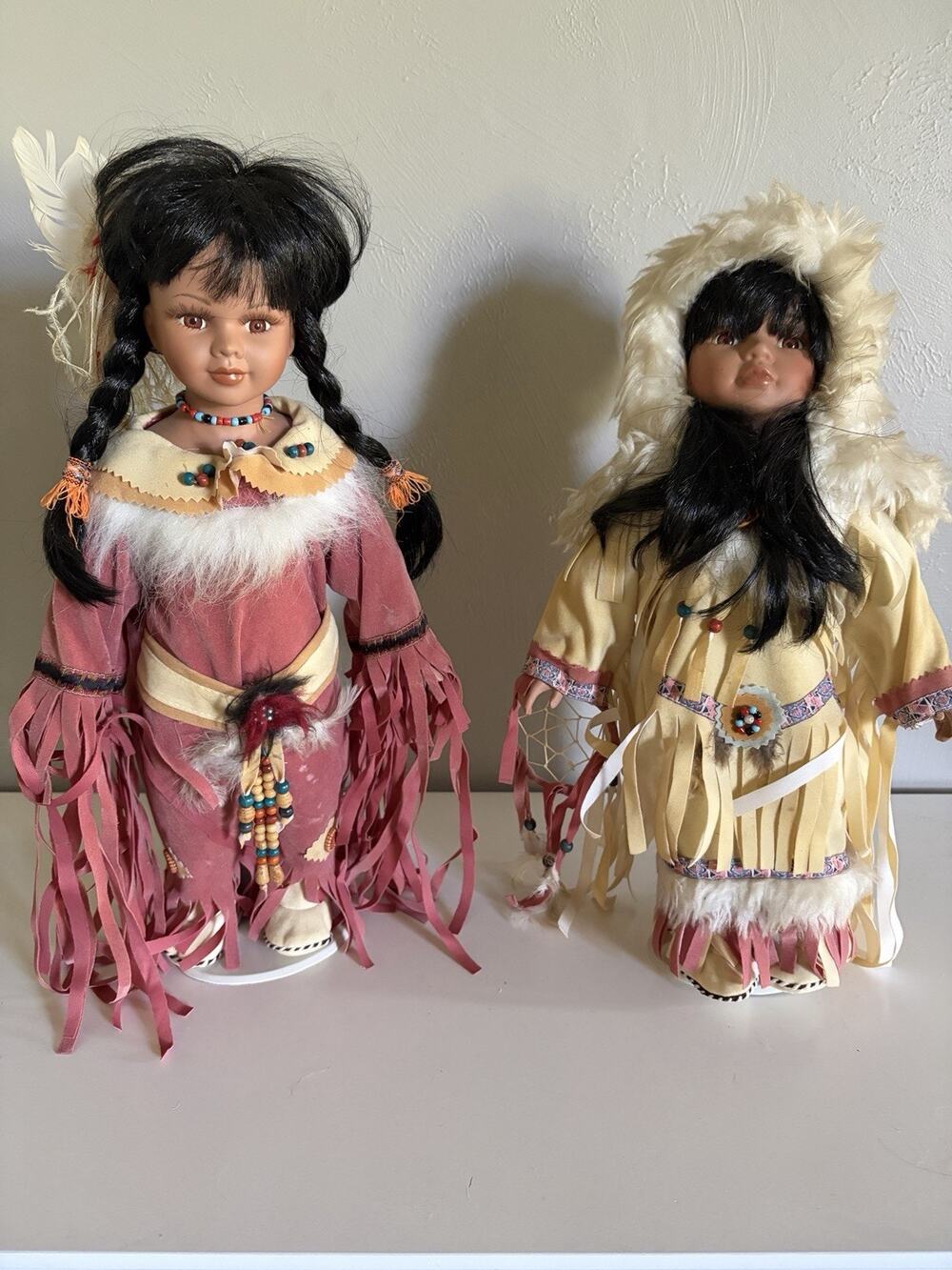 Lot 2 Golden keepsake Native American Porcelain Dolls